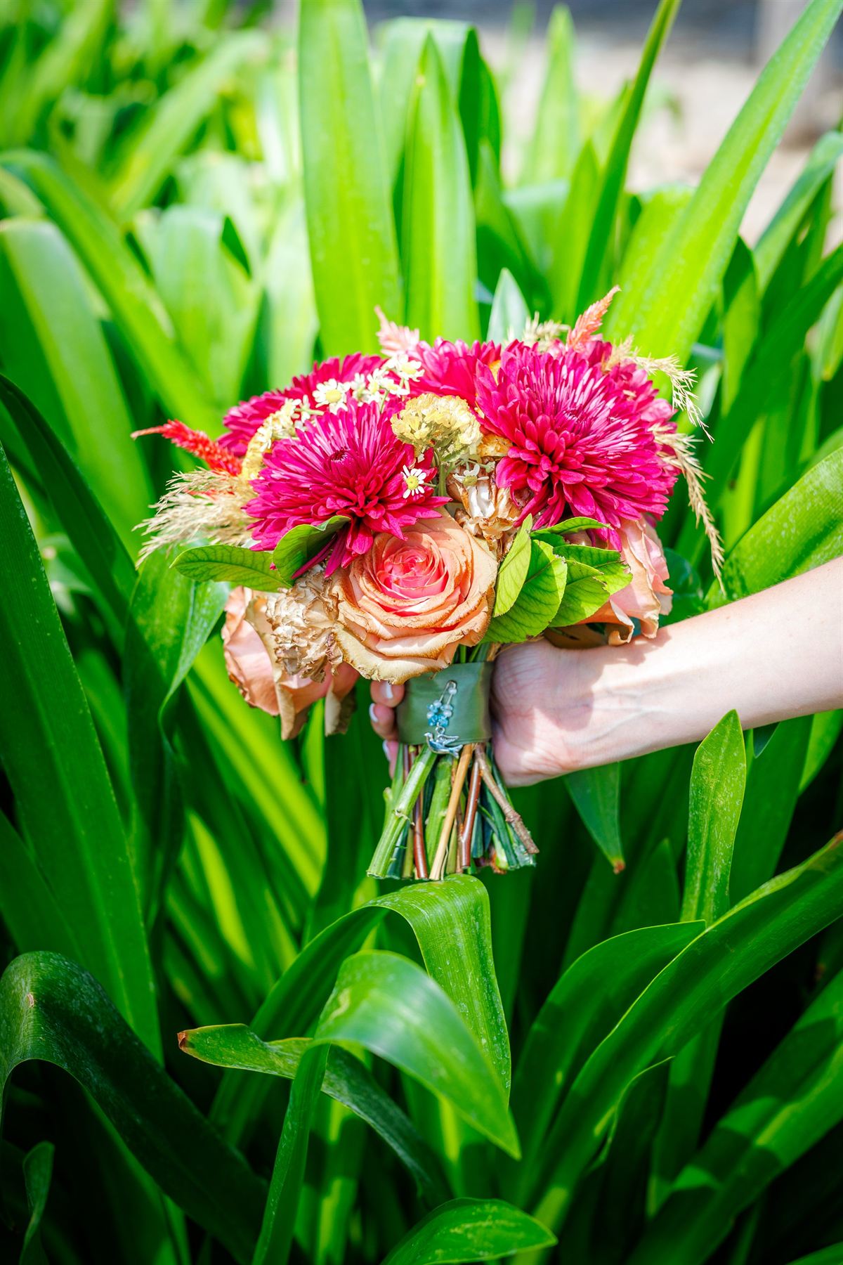 A bright bouquet against green leaves